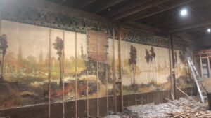 A couple renovating a 115-year-old building discovered two 60-foot-long hidden murals